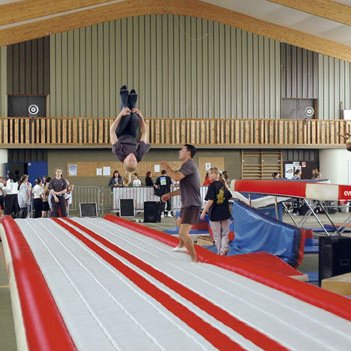 Inflatable acrobatic track